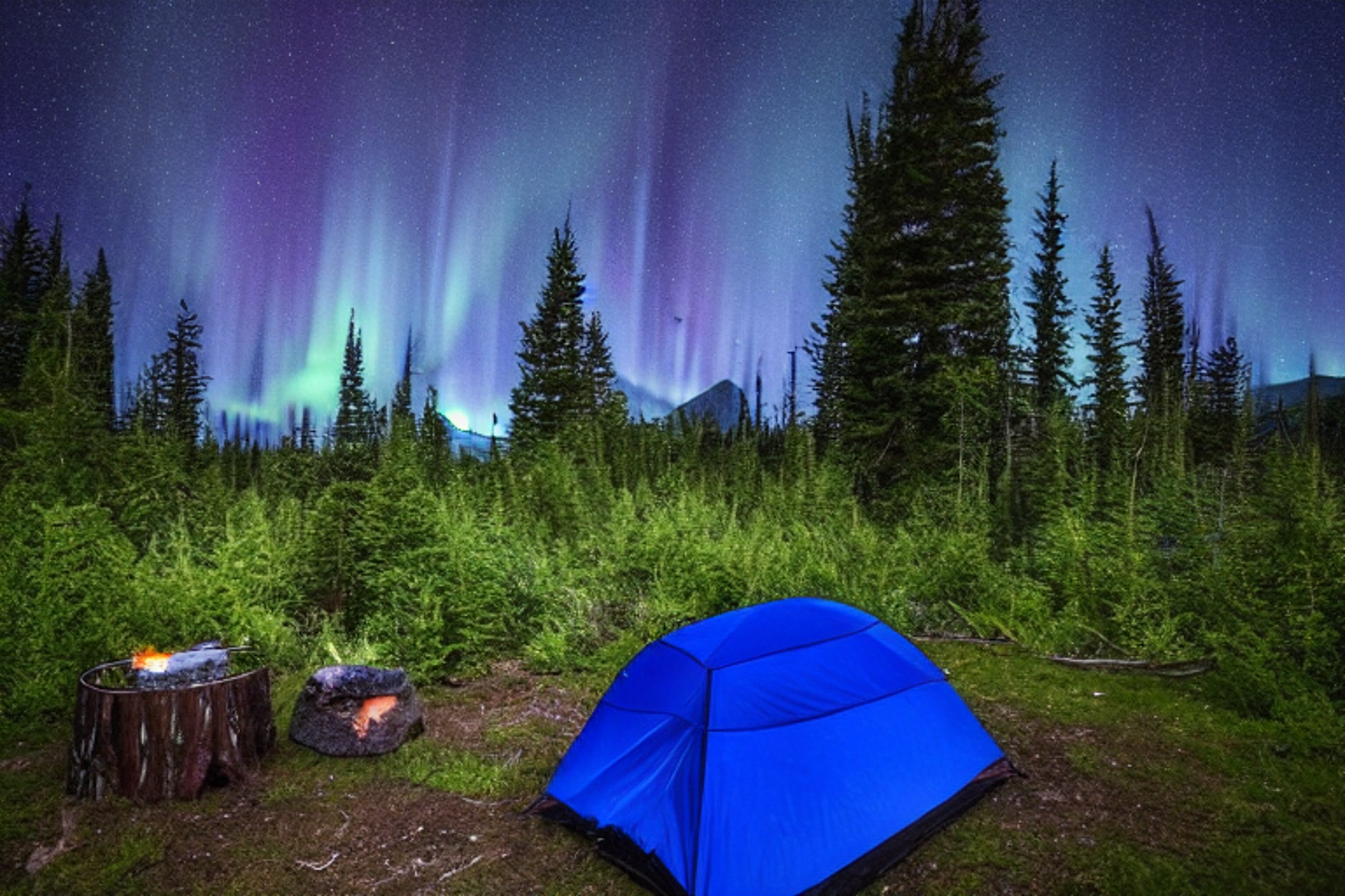 A gray-blue tent rests beside a quiet creek under a glowing green aurora. Rainy ferns surround the campfire, where logs crackle near a large fallen log and a backpack.