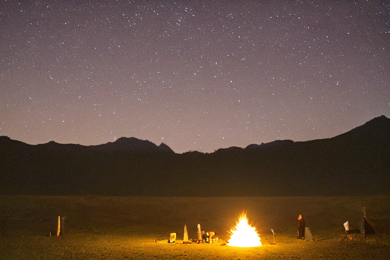 A black tent rests on a dirt patch beside a warm campfire in the New Mexico desert. Rainy skies shimmer above the campsite, with bright stars, flying birds, and distant mountains. A deer stands quietly in the distance.