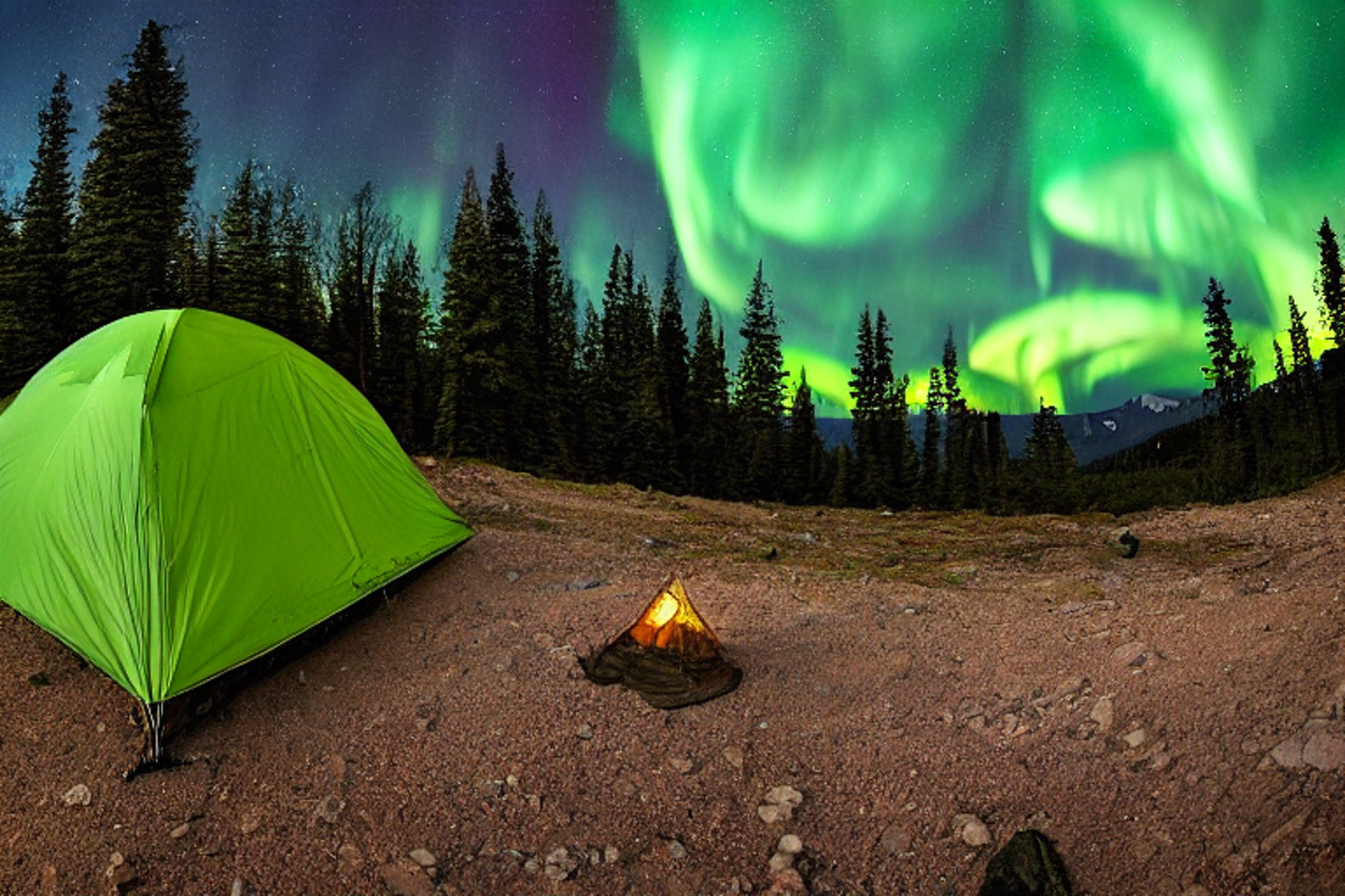 A green camo tent rests on a dirt campsite beneath glowing northern lights. Snowy trees, scattered stones, and a hammock add charm, while hikers enjoy the quiet mountain view near the California coast.